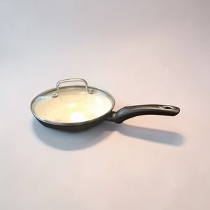 Foode Cream and Black Frying Pan with Lid